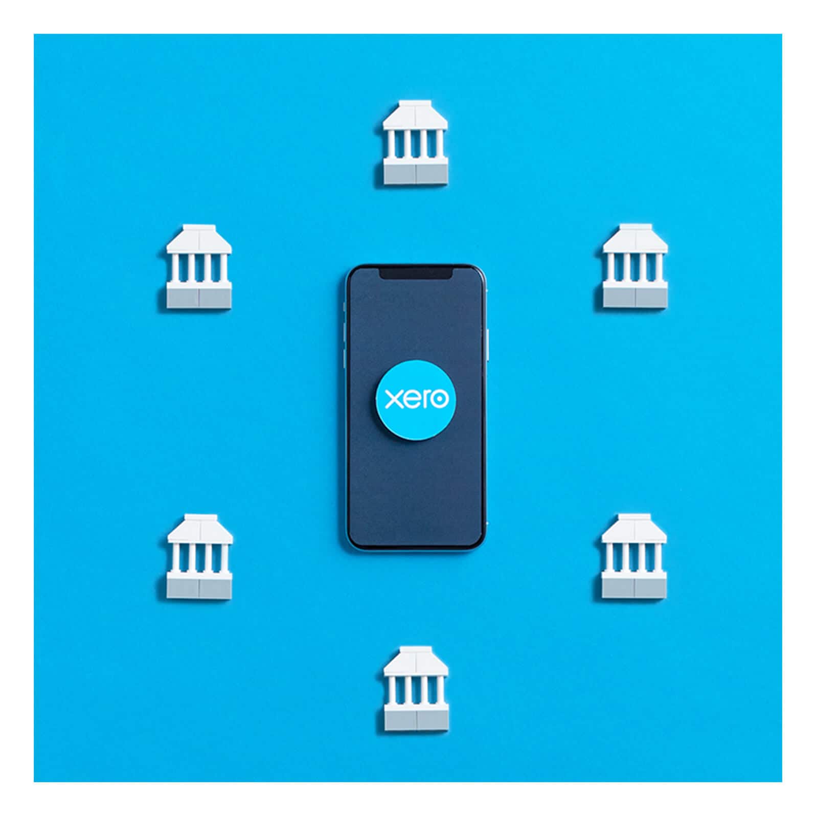 A mobile phone surrounded by banking icons to show that Xero’s accounting app connects you to your bank transactions, even on